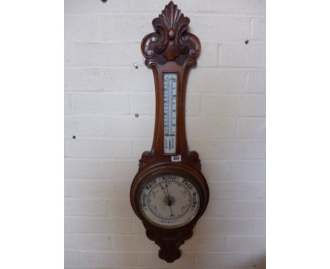 An oak aneroid barometer with thermometer - Height 89 cm