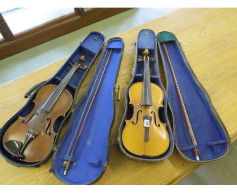 A cased Violin and bow with two piece tiger stripe 35.5 cm (14") back with label - copy of Antonius Stradiuarius - the new bo