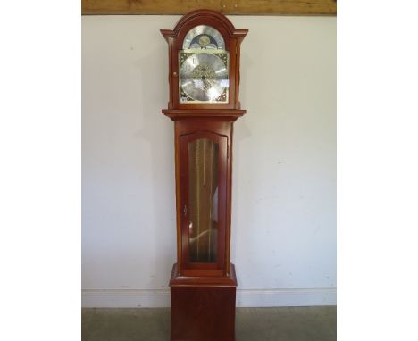 A modern yew effect three train longcase clock 