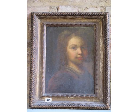Flemish School early 18th century oil on panel - A portrait of a boy wearing a red clock - in a carved giltwood frame - a fra
