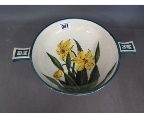A Wemyss shallow twin handled bowl decorated with Daffodils - Width 27 cm 
Condition report: General overall crazing chip to 