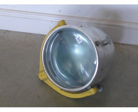 A large aluminium Aircraft landing light by Harley - mounted on a U shaped Gimble bracket - Diameter 30 cm - Total height app