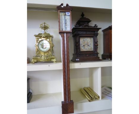 A reproduction mahogany stick barometer 