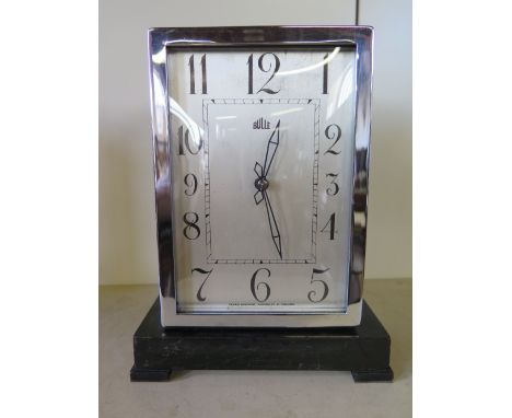 A 1930's Bulle Art Deco oak mantel clock with chrome surround - Height 23 cm x Width 18 cm
