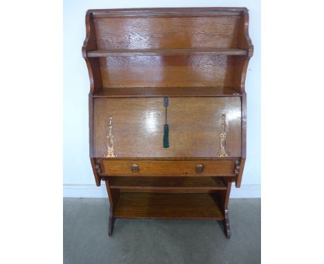 An Art Nouveau oak students bureau - Height 1.52 m x Width 92 cm 