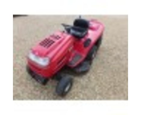 An MTD petrol auto drive ride on mower RTT 135/105B with a Briggs and Stratton engine recently serviced in working order.