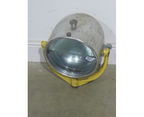 A large aluminium Aircraft landing light by Harley - mounted on a U shaped Gimble bracket - Diameter 30 cm - Total height app