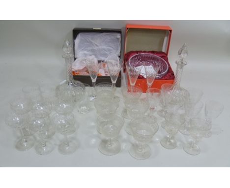 A QUANTITY OF CUT GLASS TABLE WARES, includes a pair of globe and shaft decanters with steeple stoppers, stemmed wines, tumbl