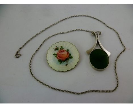 A DANISH SILVER COLOURED METAL MOUNTED DESIGNER PENDANT set with an oval agate, on chain, and a Norwegian silver coloured met