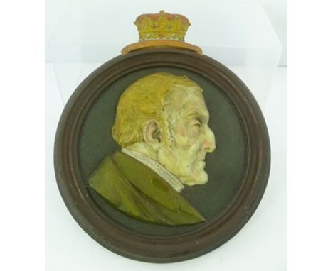 A 19TH CENTURY CAST IRON PLAQUE COMMEMORATING THE DUKE OF WELLINGTON (1769-1852), depicting a profile portrait on a matted gr