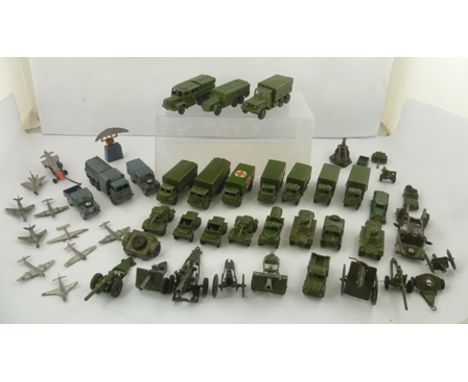 A SELECTION OF PLAY WORN ARMY DINKY DIE CAST VEHICLES, comprising four 3 ton wagons, command vehicle, artillery tractor, two 