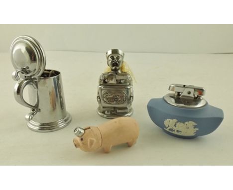 A CHROME DUNHILL TABLE LIGHTER fashioned as a lidded tankard 7.5cm high, together with a novelty lighter in the form of a fir