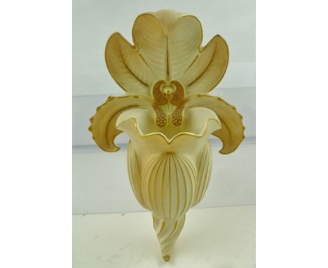 A LATE 19TH CENTURY ROYAL WORCESTER PORCELAIN WALL POCKET in the form of a Cymbidium Orchid, having blush ivory ground with g