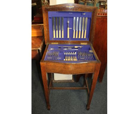 A Joseph Rodgers &amp; Sons silver plated Hanoverian pattern part canteen in oak cabinet