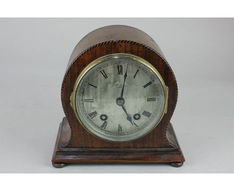 A J W Benson of London mantel clock, the circular dial with Roman numerals, striking on a gong, in domed case, 16.5cm, no key