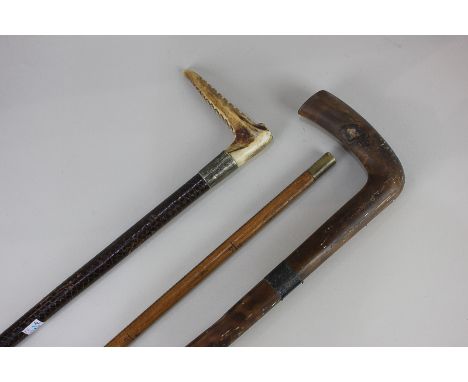 A J Rabone &amp; Sons brass capped yardstick, together with a horn handled riding crop and a silver mounted walking stick (a/