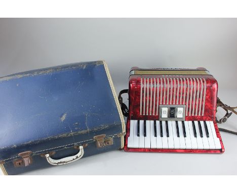 A Hohner Student VM accordion in case