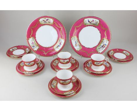 A Victorian porcelain part tea set with hand painted panels of birds, with pink border with gilt embellishments, marked Soane