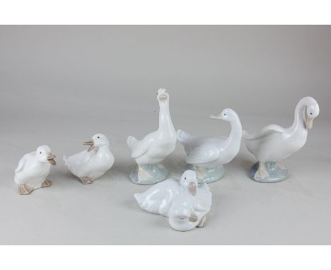 A collection of six Nao models of white ducks in various poses, largest 15cm