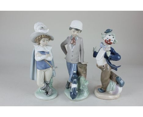 Three Nao figures comprising a clown holding a flower, 21cm, a musketeer, 24.5cm, and a boy with a dog, 24cm