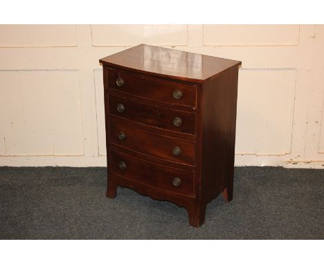 A small mahogany bow front chest of four drawers, on bracket feet, 51cm