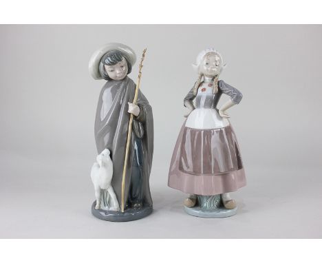 A Lladro porcelain figure of a Dutch girl, marked Daisa 1980, 25cm, together with a Nao figure of a young shepherd beside a l