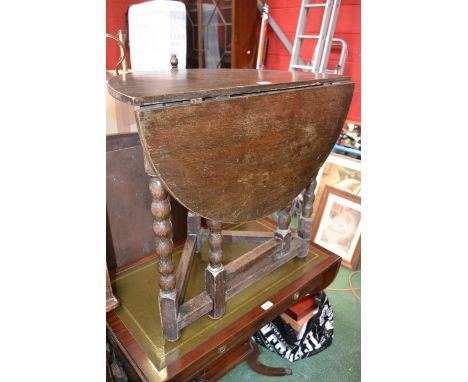 An unusual 17th century style circular gate leg table, bobbin turned supports, c.1920

