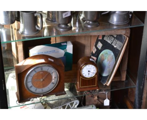 A Smith's electric mantel clock; another clock; an electronic barometer; stamp album; a crate (5)