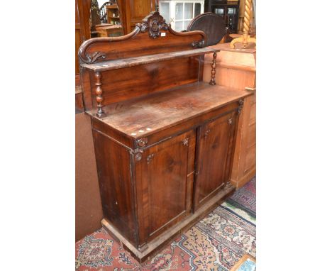 A Victorian mahogany chiffonier, carved cresting gallery, single shelf, bobbin turned supports, projecting base, two crossban