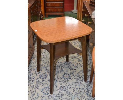 A 1950s kitchen table of small proportions, rounded square top, undertier shelf 