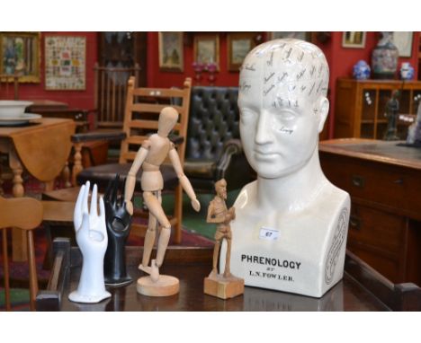 A Phrenology bust; an artists dummy; a wooden carving of Don Quixote; two ceramic hands