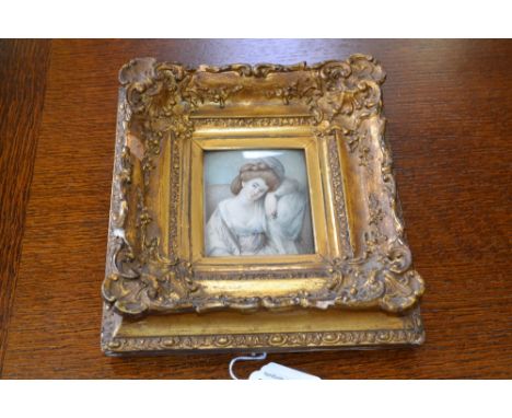 English School (early 19th century), a portrait miniature, of a lady, draped provocatively, her shawl tied loosely with a blu