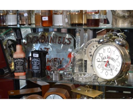 Advertising - Jack Daniels Whisky, hand painted shaped wall mirror;  pottery wall clock, large chrome case alarm clock, water