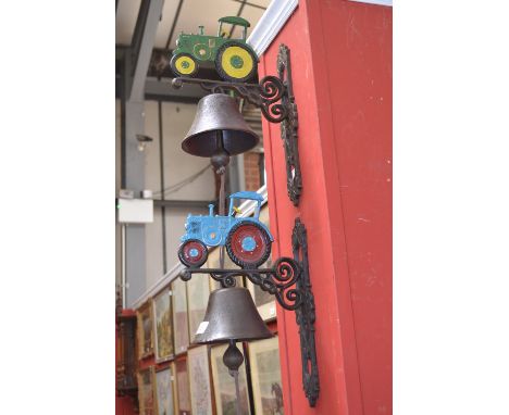Two cast iron wall mounted tractor bells