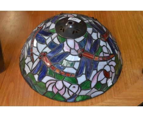 A Tiffany style multi-colour dragonfly lamp shade; another decorated with flowers