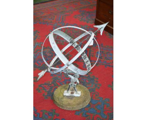 A reproduction sundial atlas anniversary clock, cast base