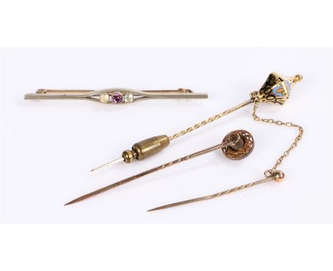 Two stick pins, one set with a diamond, together with a brooch, (3)