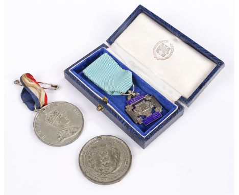 Silver and enamel Long Service medal, The National Operatic Dramatic Association, cased, together with two Coronation medals,