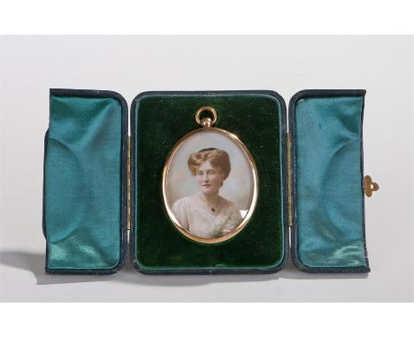 Edwardian miniature portrait, overpainted photograph image of a lady, housed within a fitted case, the miniature 6cm high  