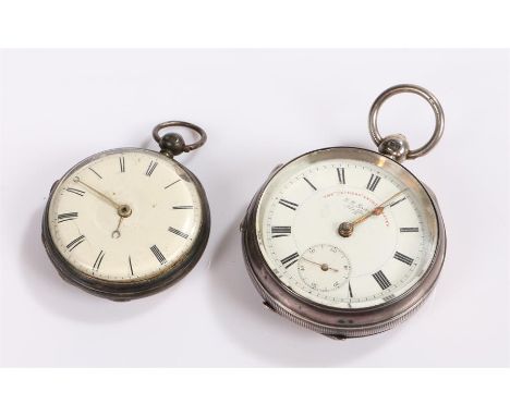 Two silver open face pocket watches, both with white enamel dials and Roman hours, (2)