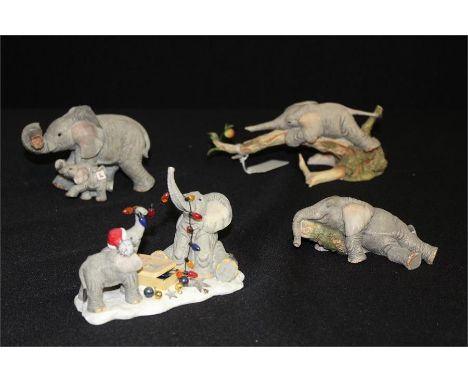 Four Tuskers ceramic Elephant ornaments (4)