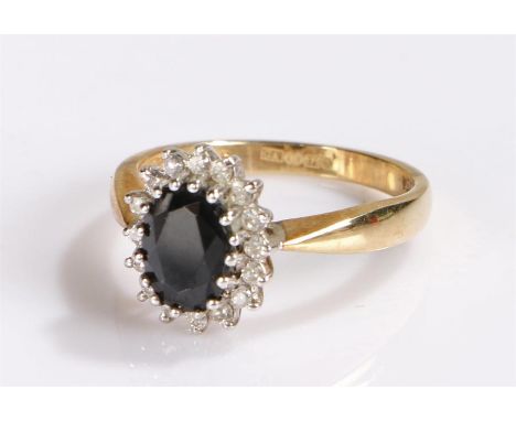 9 carat gold sapphire ring, with an oval sapphire, ring size N