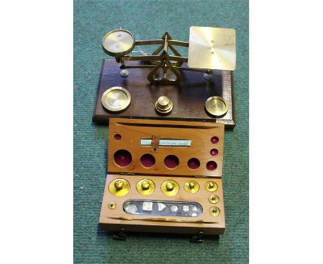 Set of postal scales, with weights, together with an F E Becker & Co cased weight set, (2)