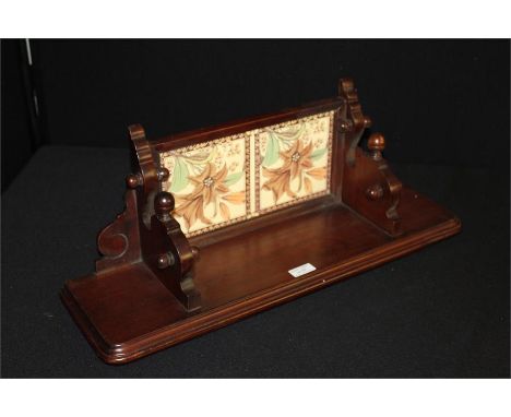 Tiled black mahogany shelf.
