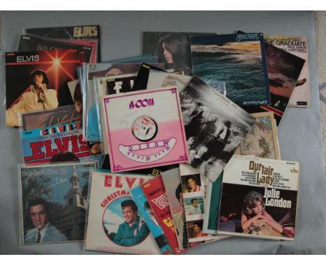 Vintage box full of LP vinyl records including a quantity of Elvis Presley plus others including Fleetwood Mac, female vocali