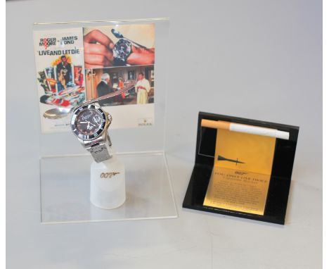 A replica "Live and Let Die" watch and a spoon together with a replica cigarette rocket from "You only live Twice" given to B