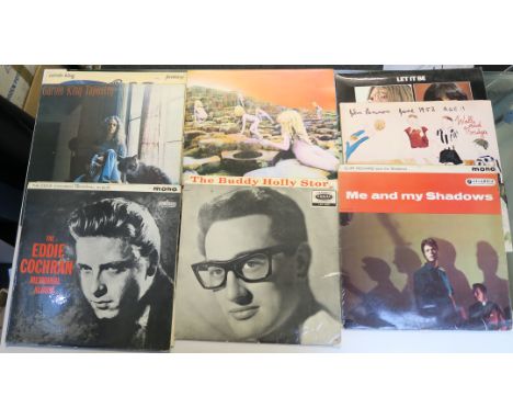 A Collection of vinyl LP albums including The Eddie Cochran Memorial album, Mono LBY 1127, The Buddy Holly Story, LVA 9105, C