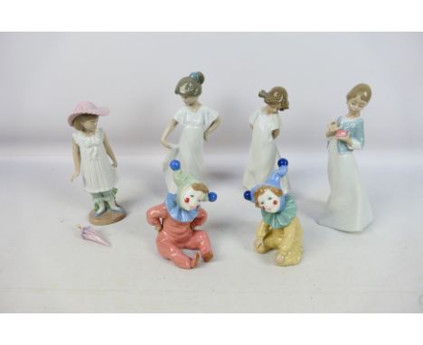 A quantity of Nao figures of young girls and child jesters, largest figure approximately 22 cm (h). [W]