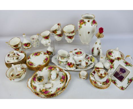 Royal Albert - A collection of ornamental and tea wares in the Old Country Roses pattern to include teapot, six cups, saucers