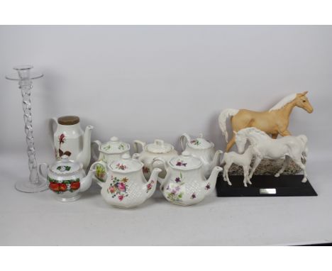 Ceramics to include teapots and two Beswick horse studies, also included in the lot is a large glass candlestick, 40 cm (h). 